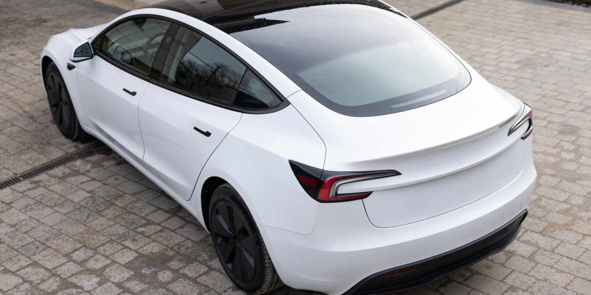 white-electric-sedan-car-standing-road-luxury-car-business-class-is-parked-city